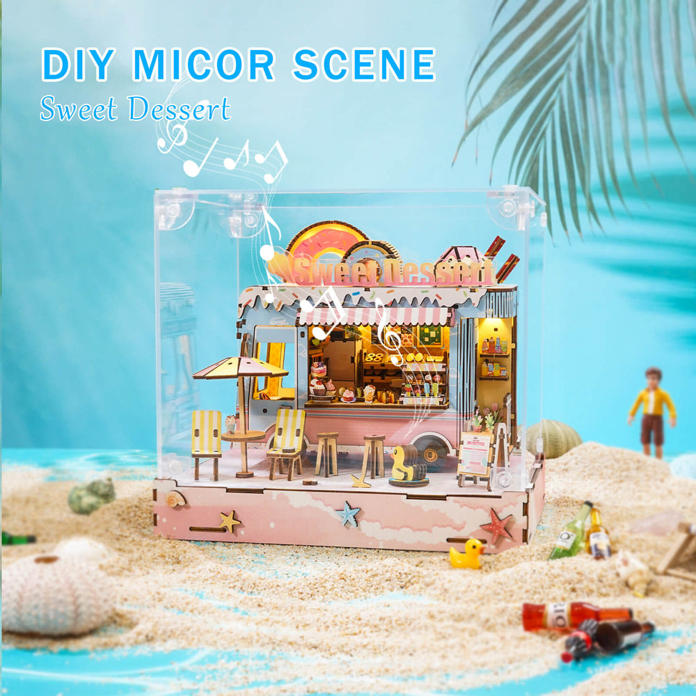 Miniature dessert cart scene with vibrant colors, showcasing DIY crafting fun in a playful beach setting.