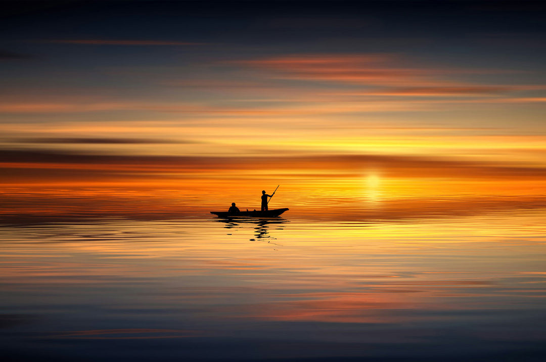 Boatman at sunset in a tranquil scene, perfect for jigsaw puzzle enthusiasts and mind game lovers.