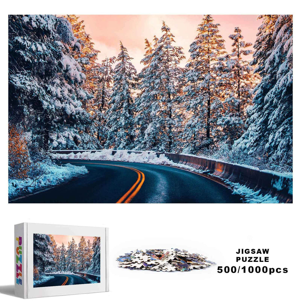 Snow Country Highway jigsaw puzzle, featuring a scenic snowy road with trees, available in 500 or 1000 pieces.