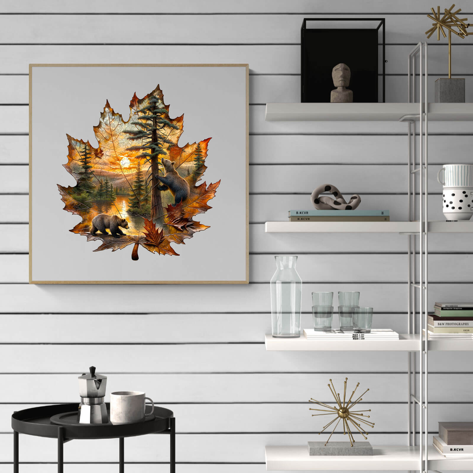 Wooden jigsaw puzzle featuring a brown bear scene inside a maple leaf design, showcasing autumn colors and forest elements.