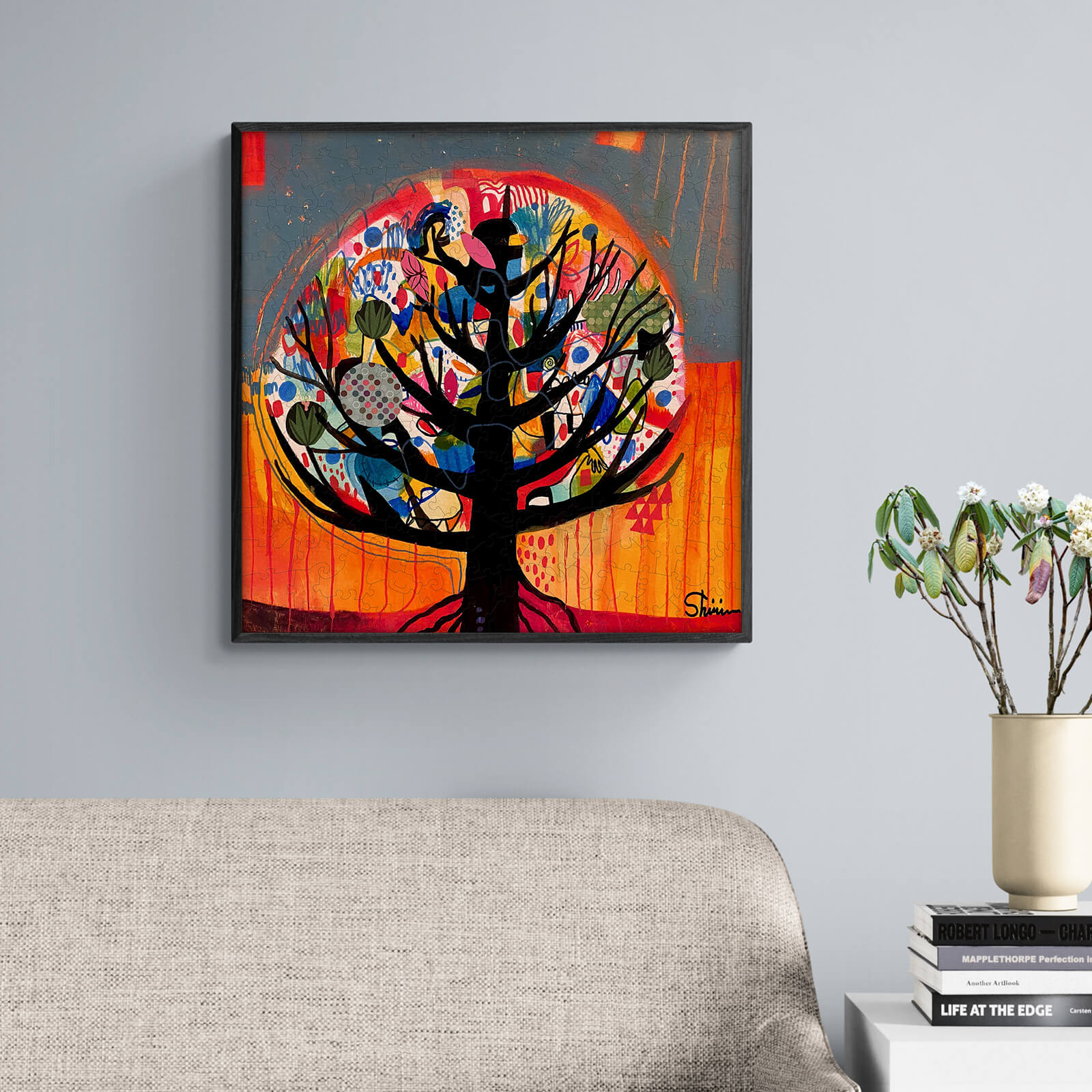 Colorful tree artwork by Shirin Moarefi, showcasing vibrant flowers and bold colors, displayed on a modern wall.