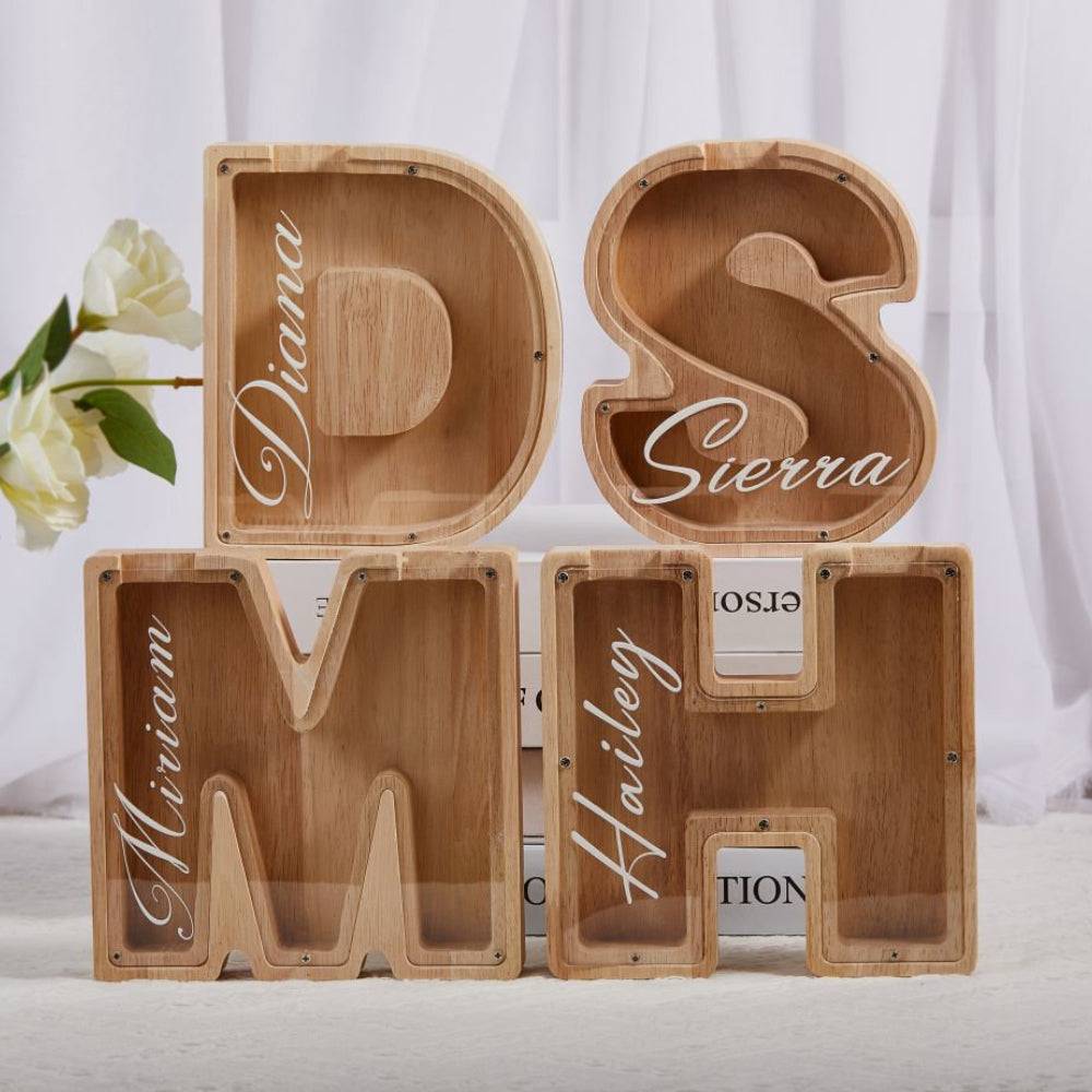 Personalized wooden letter piggy bank with names for kids, promoting savings and financial awareness.